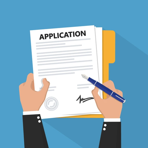 application job letter Hands holding a signed job application form with a pen