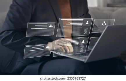 hr portal Businessman working on a laptop with floating digital HR interface