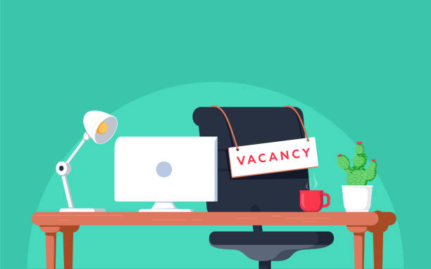 Kerala Job opportunities Office chair with a vacancy sign on a desk