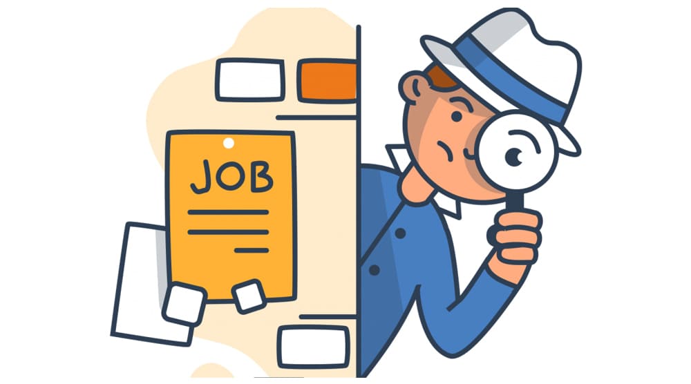 Person searching for job opportunities with a magnifying glass